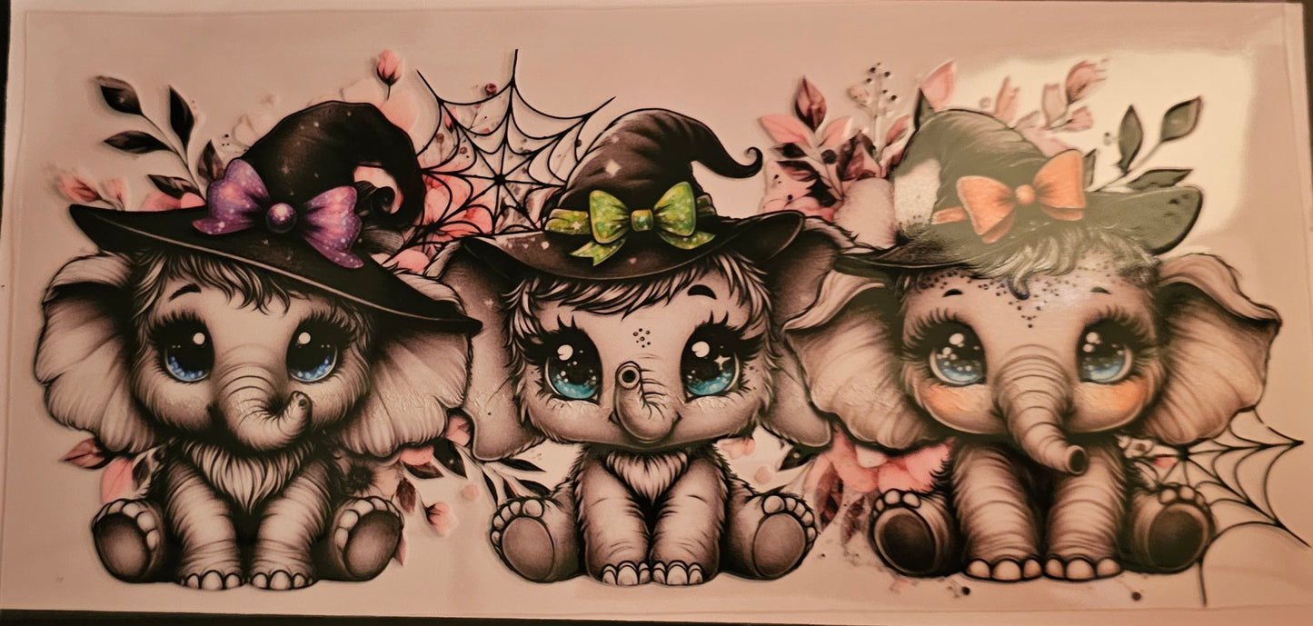 Elephants with witches hats