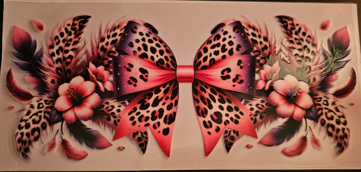 Leopard print bow and feathers