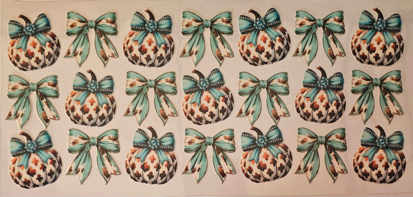 Cowhide pumpkins and bows