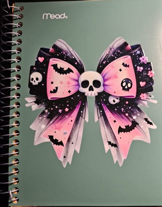 Pink and black bow with skulls notebook.