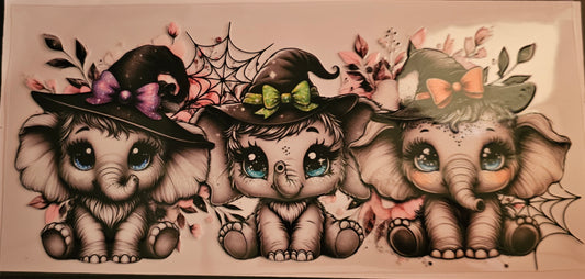 Elephants with witches hats