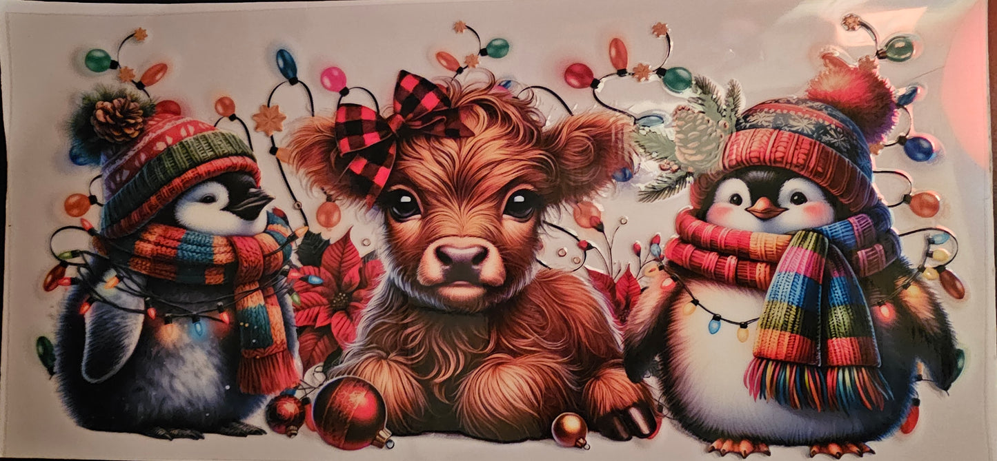 Cute highland cow with penguin friends