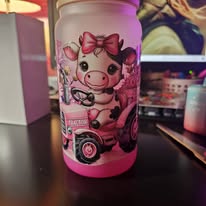 Cute highland cow on a tractor