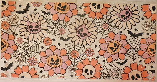 Halloween pumpkins and cats and skulls flowers