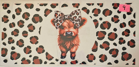 Leopard print bow and background highland cow